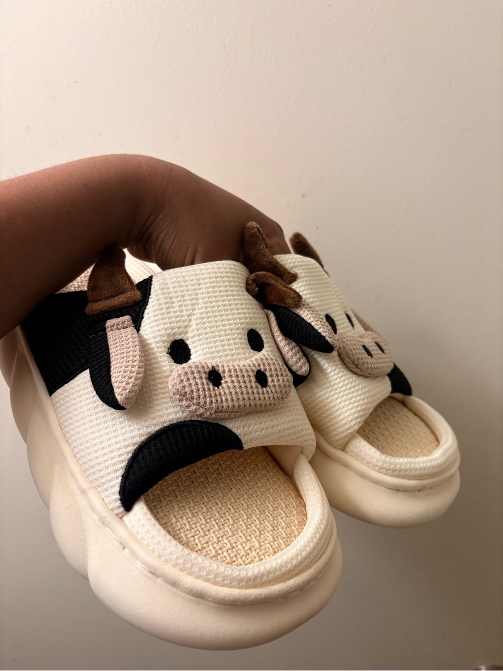 Cream Cow Slip-On Sandals with Brown Accents